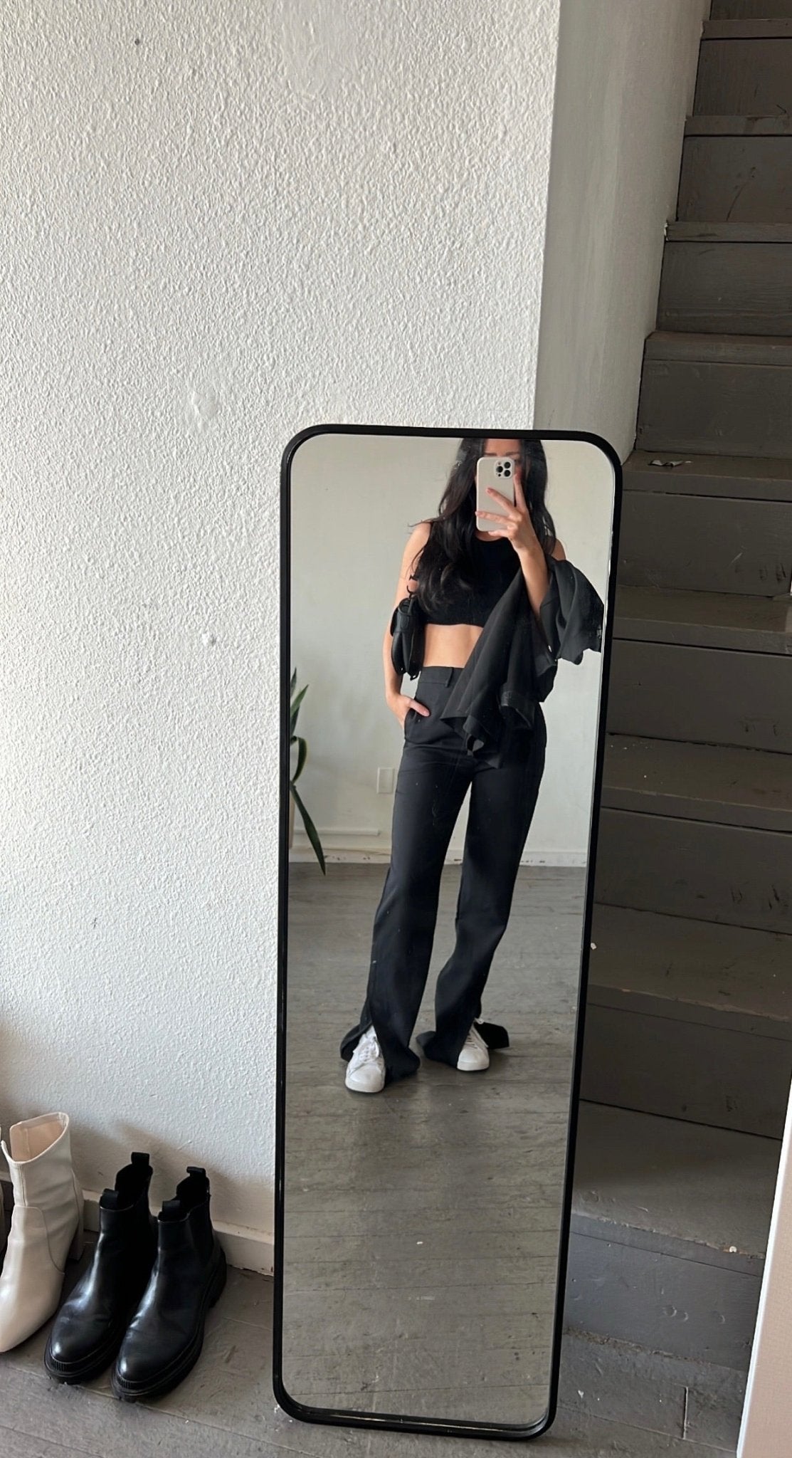 High waisted black pants with bottom slit