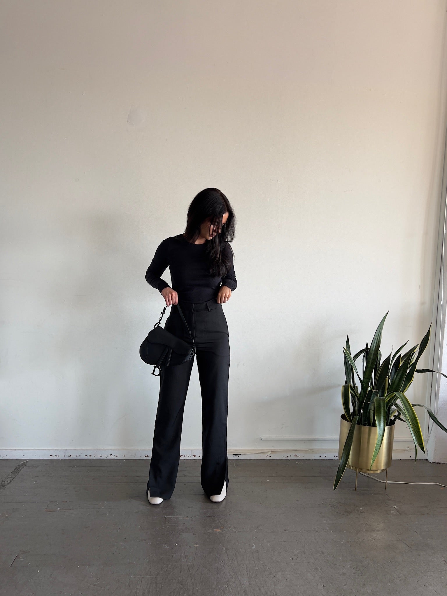 High waisted black pants with bottom slit