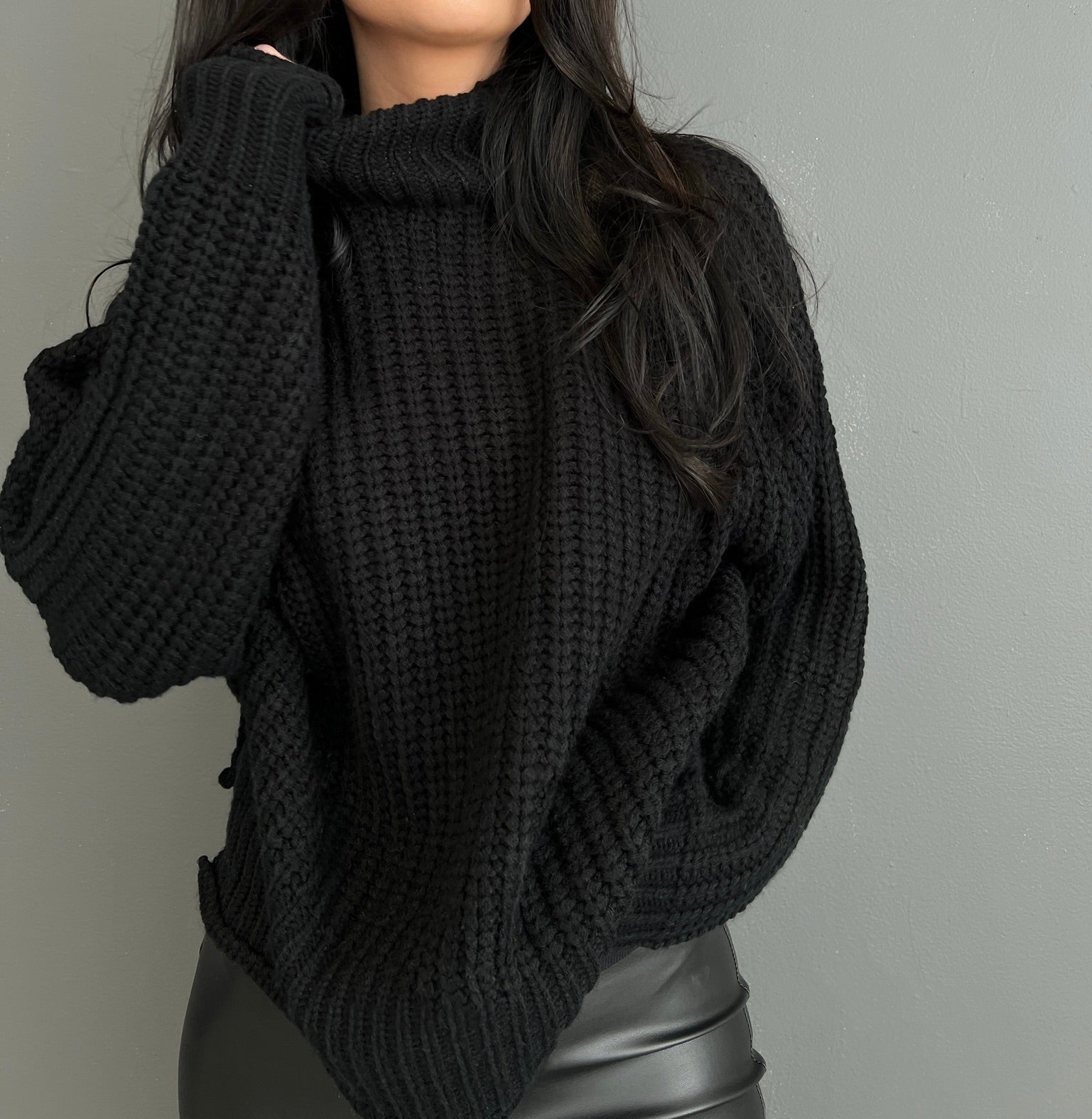 Black, chunky knit sweater