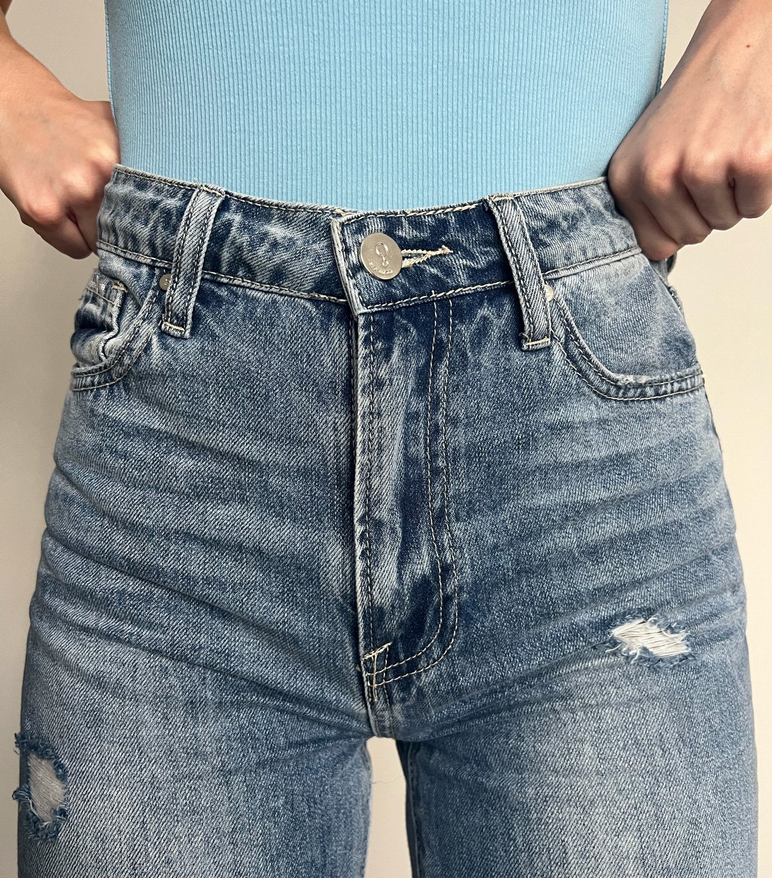 High waisted mom jeans lightly distressed