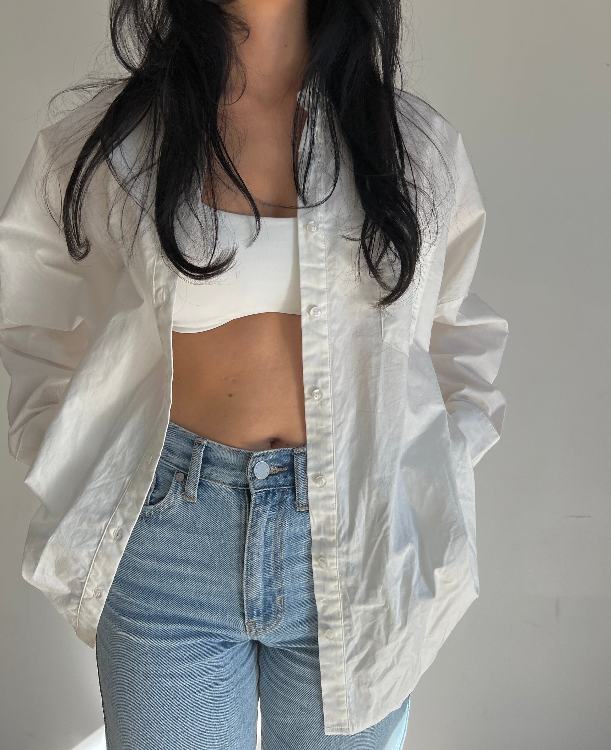 White button down long sleeve shirt with front patch