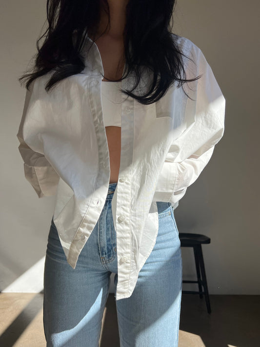 White button down long sleeve shirt with front patch